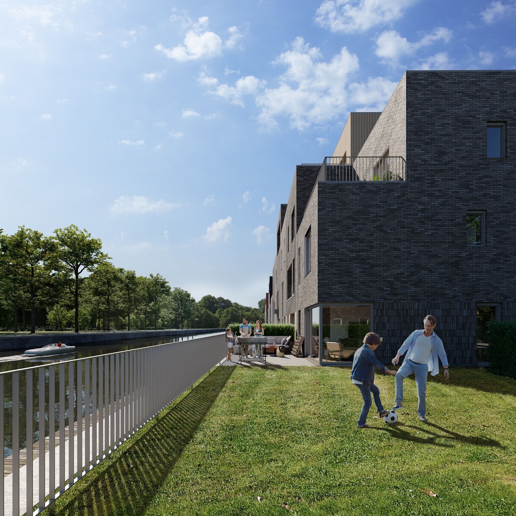 Maison au bord de l’eau, famille dans le jardin